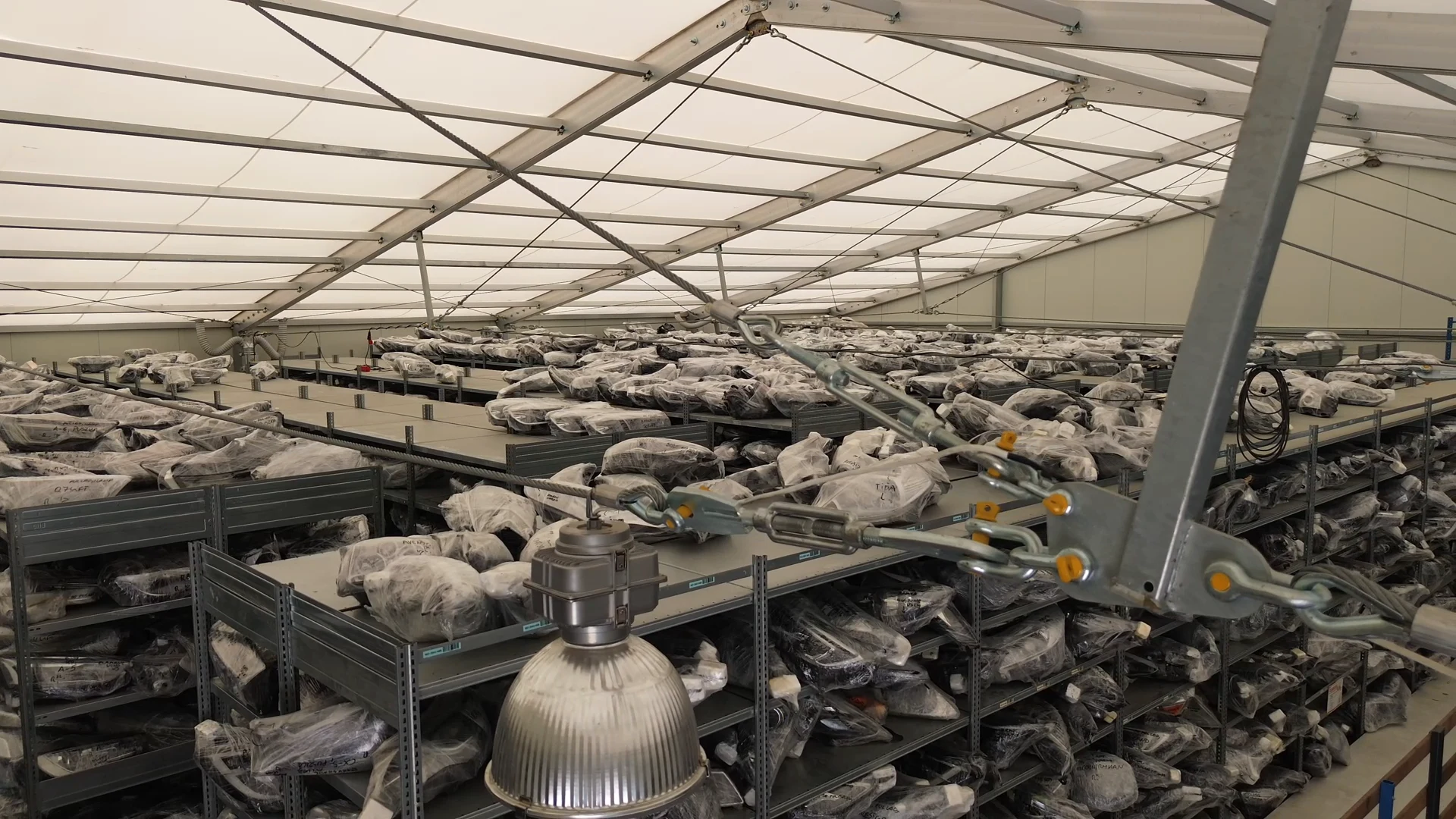 The ILUMI warehouse hall seen down the racking