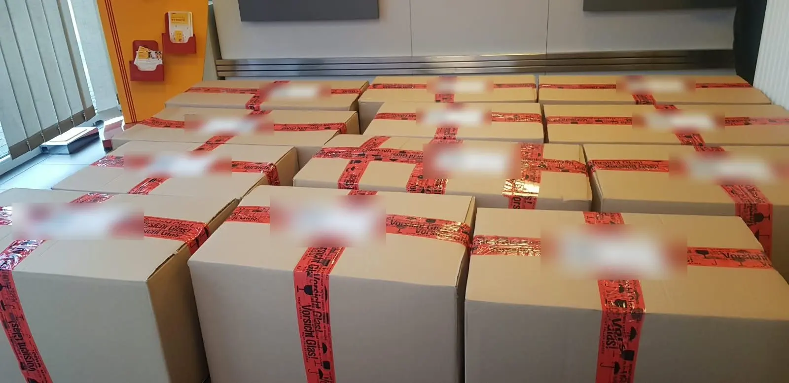 ILUMI parcels at a drop-off point